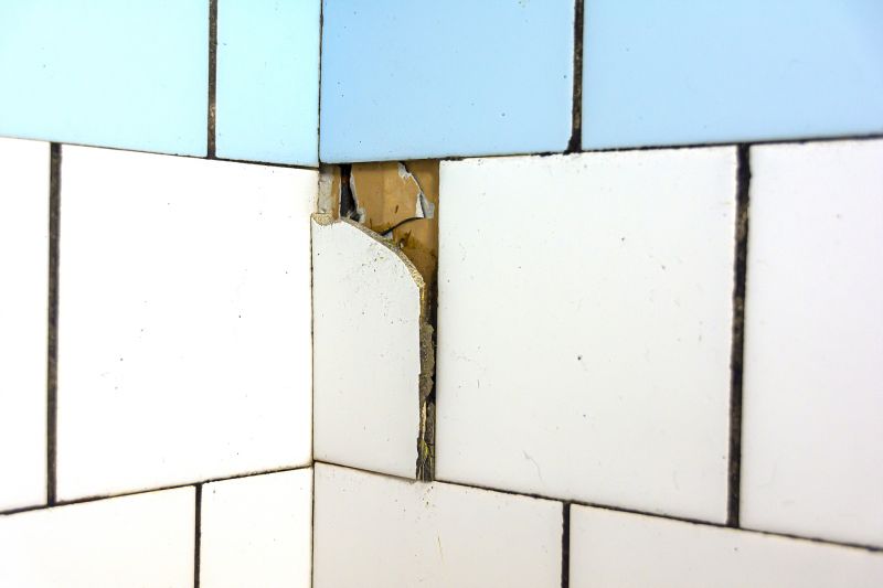 Tile repair work in a hallway